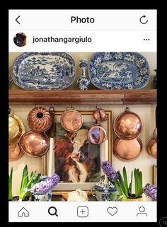 an instagram photo is displayed on the wall in front of pots and pans