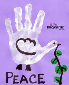 a child's handprint with the words peace written on it and a plant