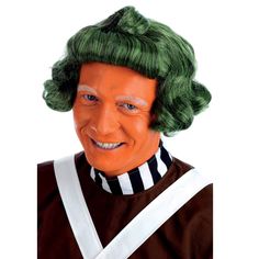 a man with green hair wearing an orange wig