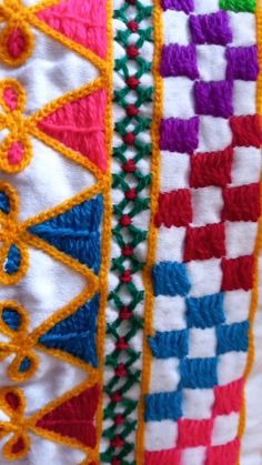 close up view of colorful crocheted fabric