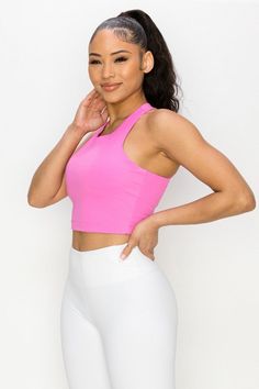 Featuring a high neckline and a strappy open back, this longline sports bra is perfect for any type of workout and you'll be fully supported with style. Best part, the inner lining is all mesh with two removable pads for your comfort. Strappy X back detail High neckline Matte fabric detail Two removable cups with mesh lining Longline hem for comfort and tummy control during workouts Moisture wicking fabric 75% Nylon, 25% Spandex Lining: 80% Nylon, 20% Spandex Imported Model StatsHEIGHT: 5'9" BUS Sporty T-back Halter Top For Gym, Sporty T-back Halter Top For Sports, Athleisure Crop Top With Built-in Bra For Light Sports, Pink Crop Top With Built-in Bra And High Stretch, Pink High Stretch Crop Top With Built-in Bra, Spring Functional Sports Bra With Bra Friendly Design, Pink Stretch Halter Top With Built-in Bra, Spring Training Sports Bra, Pilates Racerback Crop Top