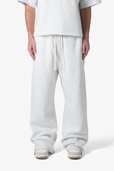 the Washed Ultra Baggy Sweatpants are designed with a baggy fit throughout, featuring an elasticized self waist, tonal cotton drawstrings, standard hem at the leg opening, and finished in both a washed and brushed fleece fabric. details baggy fit 100% cotton, 360 gsm model is 6’1, 140 lbs and wears a size medium note: this fit is intentionally baggy in waist and fit, for a more relaxed fit we recommend sizing down Affordable Baggy Sweatpants, Wide Legged Sweatpants, Baggy White Sweatpants, White Baggy Sweatpants, Baggy White Pants, Pants Essentials, Baggy Grey Sweatpants, Baggy Sweatpants Outfit, Baggy Sweats