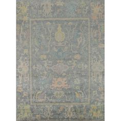 an antique rug with blue and yellow colors