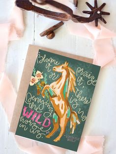 a greeting card with an image of a horse on the front and words below it