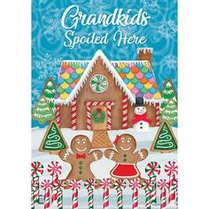 a christmas card with gingerbreads and candy canes in front of a house