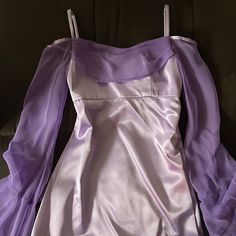 Customized Lilac Y2k Dress Worn Once For A Wedding In 2002ish Amazing Condition Fits Like An Xs. The Sleeves Are Cascading Bell With The Open Area Facing Outward. Dress Is Floor Length And Has A Slight Flare. As A Slight Stain On The Back By The Zipper. I Zoomed In So It Can Me Seen. Y2k Dress, Wearing Dress, Dresses Xs, A Wedding, Floor Length, Lilac, Colorful Dresses, Stain, Womens Sizes