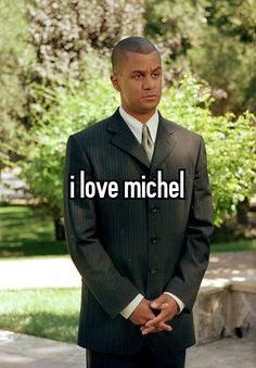 a man in a suit with the words i love michael on it