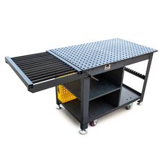 a black table with wheels and a yellow bin underneath it, on a white background