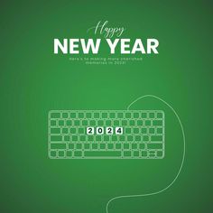 a keyboard and mouse with the words happy new year written in white on a green background