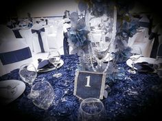 the table is set with blue and white decor