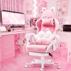 a pink room with hello kitty furniture and decorations on the walls, including a computer desk