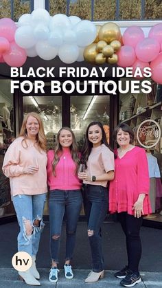 four girls are standing in front of a black friday sign with balloons and pink shirts