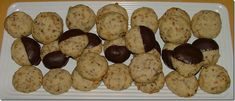 a white plate topped with chocolate covered cookies