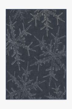 a black and white photo with snowflakes on it's side, the words ruggable