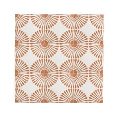 an orange and white wallpaper with large fan design on it's side, in front of a white background