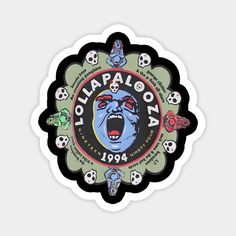 a sticker with an image of a gorilla on it's face and skulls around it