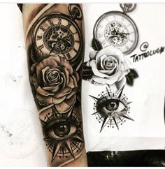 a black and white photo of a rose with an all seeing eye tattoo on the arm