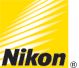 the nikon logo is shown on a yellow background with white and black lines behind it