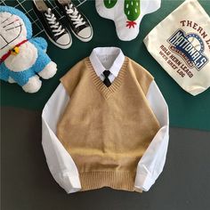 Product Show： Casual Sleeveless School Vest, White Cotton Tank Top For Fall, White Layering Sweater Vest, Classic White Vest For Fall, Classic White Vest For Layering, White Vest Top For Winter, White Sleeveless Sweater For Layering, White V-neck Tank Top For Winter, White Winter Sweater Vest