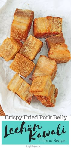 crispy fried pork belly recipe with lemon kiwia on the side and text overlay