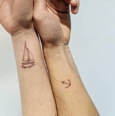 two people with matching tattoos on their arms