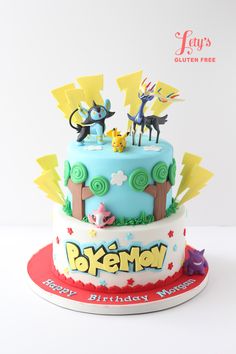 a pokemon themed birthday cake on a red and white plate