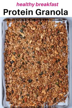 healthy breakfast protein granola in a glass baking dish with text overlay that reads, healthy breakfast protein granola