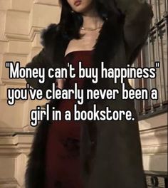 a woman in a red dress and black coat with the words money can't buy happiness you've clearly never been a girl in a bookstore