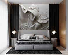 a bedroom with a large white painting on the wall and a bed in front of it