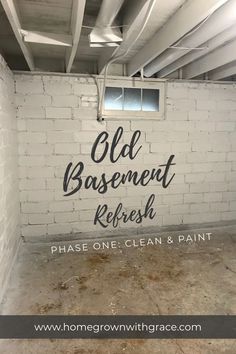 an old basement refreshh painted on the wall with white paint and black lettering