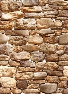 a stone wall made out of different types of rocks