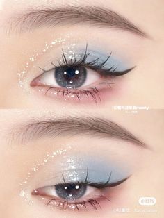 two blue eyes with white glitter on them and one has long lashes, the other is dark