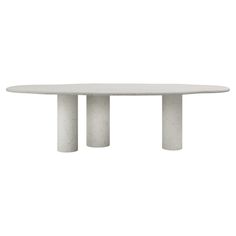 a white table with three columns on it's sides and one column in the middle