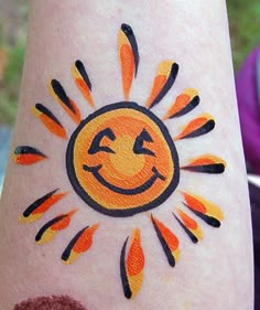 Happy Face Paint, Face Paint Ideas For Beginners, Small Face Paint Designs, Sunshine Face Paint, Hawaiian Face Paint Easy, Luau Face Painting Ideas, East Face Paint Ideas, Fast Easy Face Paint Designs, Beginner Face Paint