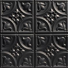 an image of a black tile pattern that looks like it is made out of metal