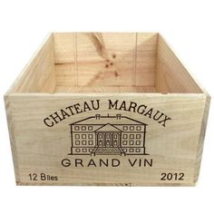 a wooden crate with the words grand vin on it's side and an image of a