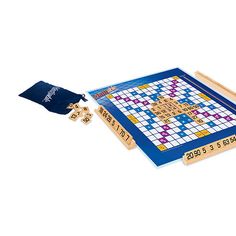 a wooden crossword game set with two pieces and one piece missing from the board