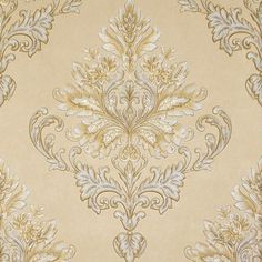 an ornate wallpaper pattern in gold and white