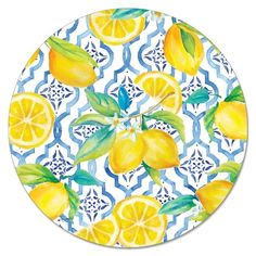 a blue and white plate with lemons on it