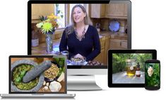 a woman is on her computer, phone and laptop with food in front of her