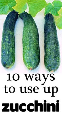 three cucumbers with green leaves on them