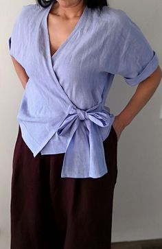 Loose washed linen kimono wrap shirt with bow and 3/4 sleeves lilac blue Spring Blue Linen Short Sleeve Shirt, Purple Linen Shirt, Blue Linen V-neck Blouse, Fitted Linen V-neck Wrap Top, Light Blue Linen Button-up Shirt, Linen Loose Dress, Short Sleeve Linen Shirt, Linen Kimono, Lilac Blue