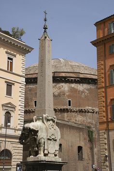 a statue in the middle of a city square