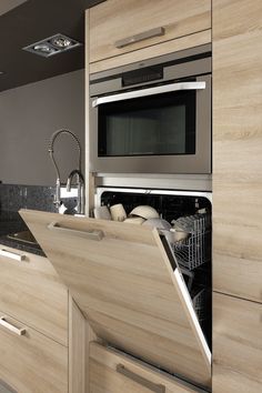 an appliance that is open to show the kitchen