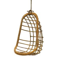 a hanging chair made out of rattan and rope with a bird perched on top