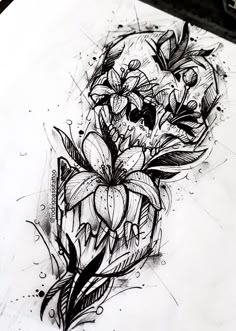 a drawing of a skull with flowers on it