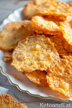 fried potato chips on a plate with ketchup