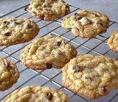 chocolate chip cookies cooling on a rack in the oven, ready to be baked and eaten