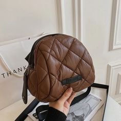 Everyday Brown Quilted Shoulder Bag, Everyday Quilted Brown Shoulder Bag, Brown Leather Bags For Winter, Casual Brown Quilted Bag, Trendy Leather Winter Bags, Trendy Leather Bag For Winter, Chic Leather Bags For Winter, Brown Quilted Shoulder Bag, Quilted Leather Shoulder Bag For Daily Use