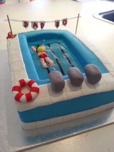 a cake shaped like an inflatable swimming pool